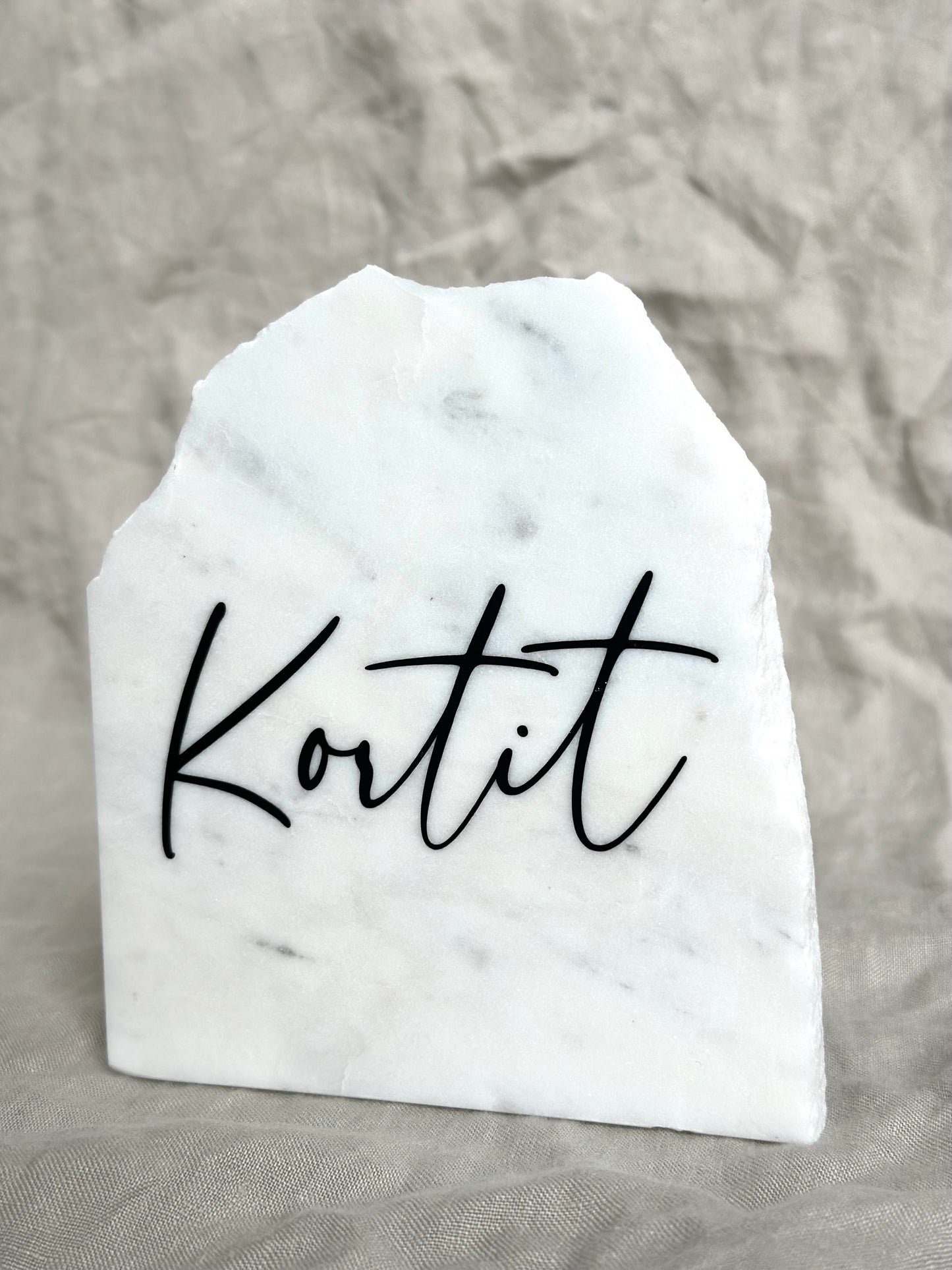 Kortit-marmorikyltti