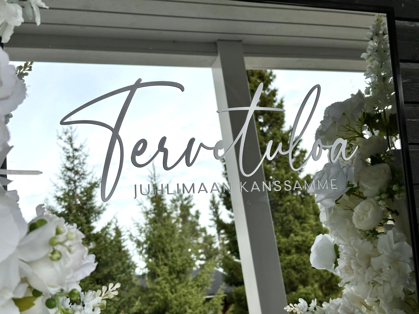 Tervetuloa-peili tarroilla