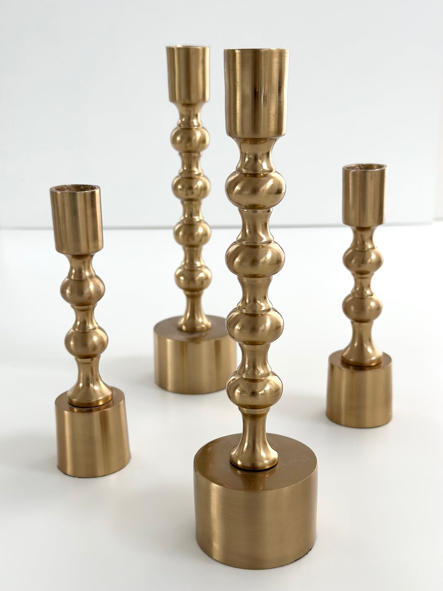 Kultaiset kynttilänjalat