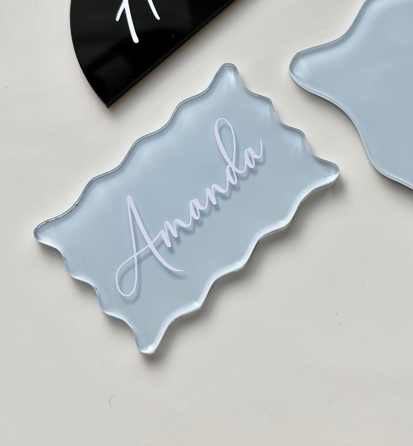 Paikkakortti aaltoreuna